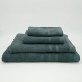 Drap de bain gris en éponge bouclette, doux et ultra-absorbant , idéal pour un séchage rapide et confortable au quotidien.