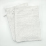 Gants de toilette blanc en éponge bouclette, doux et ultra-absorbants, 100% coton parfaits pour un soin quotidien du visage et du corps.