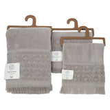 Lot Romance Taupe en éponge velours 100 % coton, 90x150 cm, doux et absorbant, parfait pour la plage ou la salle de bain.