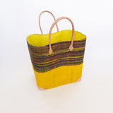 panier artisanal Tsivory safran SGM rabane tissée unie et rayée avec pochon, coins et poignées cuir dimensions 55x24x35 cm fond renforcé, idéal pour le marché ou la plage.