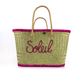 Panier artisanal malgache Soleil en fibres naturelles, aravoula tressé, brodé, solide et élégant pour plage ou ville.