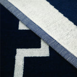 Serviette de plage XL éponge velours Jacquard Bleu 140x180 400g/m² - Bastia - Le comptoir de la plage