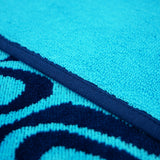Serviette de plage éponge velours Jacquard Bleu 90x170 400g/m² - Nonza - Le comptoir de la plage