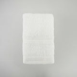 Serviette invité blanche en éponge bouclette, douce et ultra-absorbante, 30x50 cm, idéale pour un séchage rapide et élégant.
