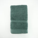 Serviette invité grise 100% coton en éponge bouclette, douce et ultra-absorbante, idéale pour un séchage rapide et élégant.