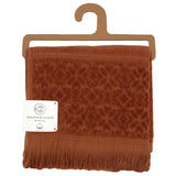 Serviette de toilette Romance Caramel en éponge velours 100 % coton, 50x90 cm, douce et absorbante parfaite pour la plage ou la salle de bain.