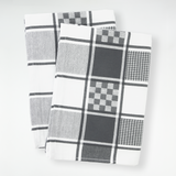 Deux torchons jacquard 50x70 cm gris en coton, alliant élégance, douceur et résistance.