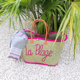 Panier artisanal "Pasika" avec motif brodé "LA PLAGE" - Le comptoir de la plage