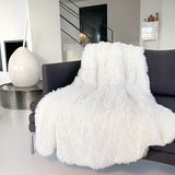 plaid longwool naturel 130x170 cm imitation fourrure à poils longs, 450g/m², ultra doux et élégant pour sublimer et réchauffer votre canapé.