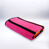 serviette de plage éponge velours jacquard glamchic rose 90x170 400g/m² douce, absorbante et élégante, parfaite pour plage et piscine.