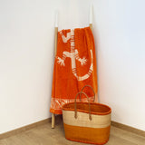 serviette de plage Nossa éponge velours jacquard orange 90x170cm 100 % coton 400g/m², douce et absorbante, idéale plage, piscine ou détente.