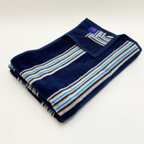 serviette de plage éponge velours jacquard milonga bleu marine taille 70x140 100 % coton, 400 g/m², douce et légère, absorbante, parfaite pour plage, piscine ou sport.