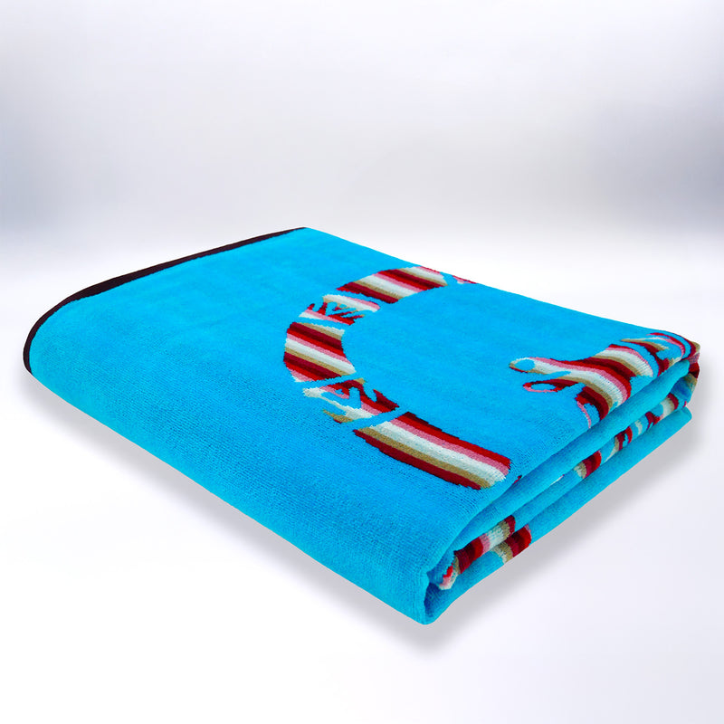 Serviette de plage XL pliée velours Jacquard bleu turquoise Carvao - Le Comptoir de la Plage