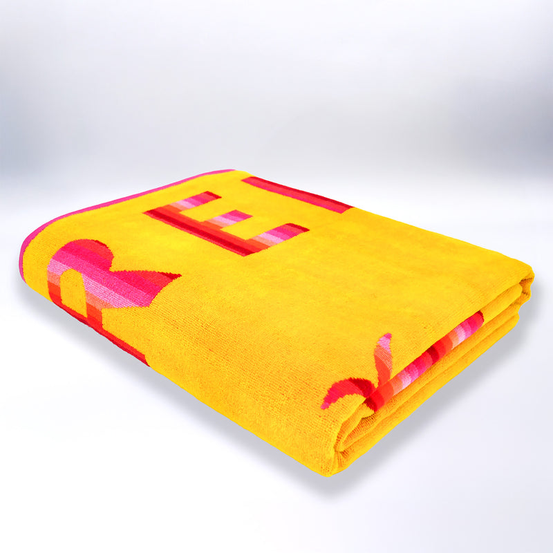 Serviette de plage XL pliée velours Jacquard jaune Malta - Le Comptoir de la Plage