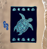 Serviette de plage XL velours Jacquard bleu Calypso - Le Comptoir de la Plage