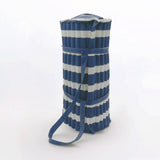 zoom matelas de plage « Bahia » bleu marine 60x180 avec coussin intégré et bandoulière, assorti à sa serviette de plage coordonnée