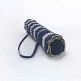 zoom matelas de plage « Bahia » bleu marine 60x180 avec coussin intégré et bandoulière, assorti à sa serviette de plage coordonnée