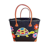 Panier artisanal rabane "Tortue" avec motifs brodés