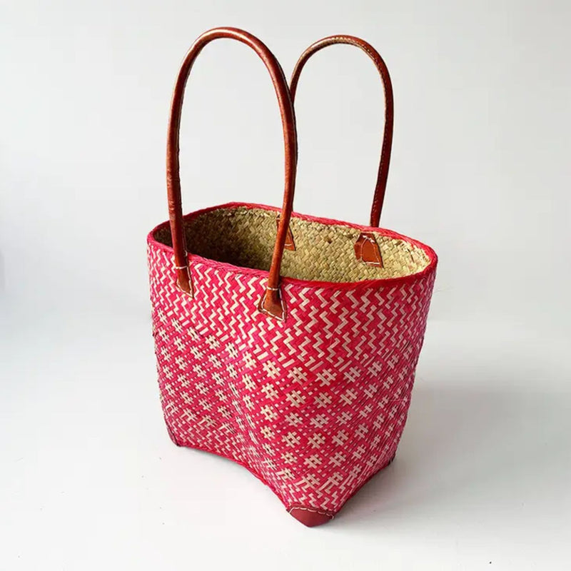 Panier artisanal rose fuchsia Frise - Le comptoir de la plage