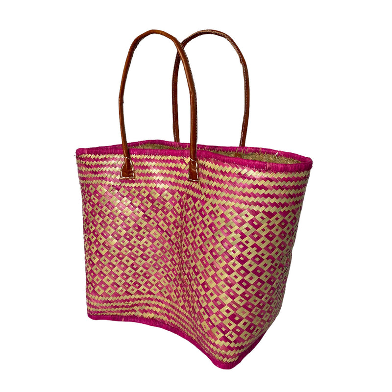 Panier artisanal fuchsia Rayas - Le comptoir de la plage