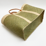 panier artisanal tsimgy naturel dessous SGM tressage naturel bordure rabane avec poignées en cuir dimensions 45x20x30 cm idéal pour marché plage ou courses robuste et élégant