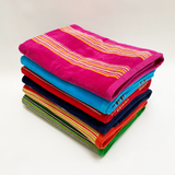 serviette de plage éponge velours jacquard milonga turquoise taille 70x140 100 % coton, 400 g/m², douce et légère, absorbante, parfaite pour plage, piscine ou sport.
