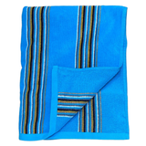 serviette de plage éponge velours jacquard milonga turquoise taille 70x140 100 % coton, 400 g/m², douce et légère, absorbante, parfaite pour plage, piscine ou sport.